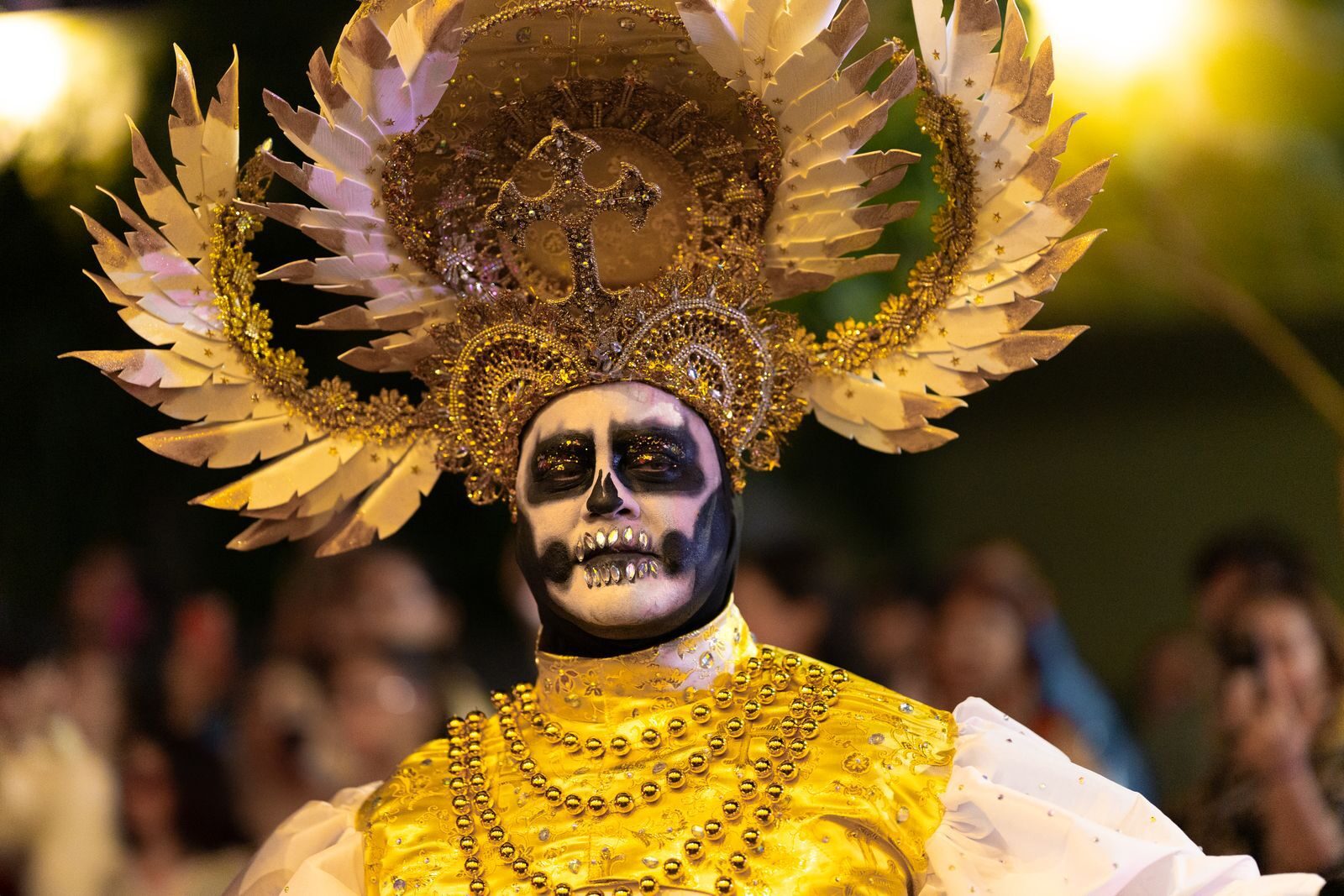 Stunning Day of the Dead costume at a colorful parade in Merida, Yucatan, Mexico.