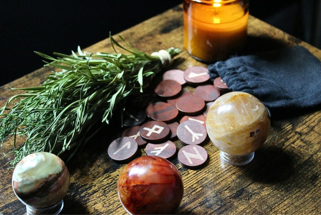 a wooden table topped with lots of different types of items
